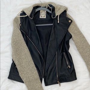 Leather jacket with cloth arms